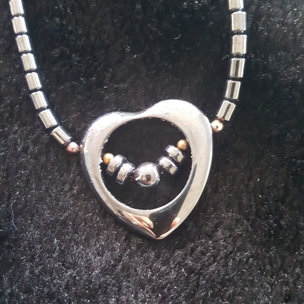 Interesting bead and heart necklace
